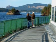 Ferry riders approach Orcas Island, courtesy of Robert Demar